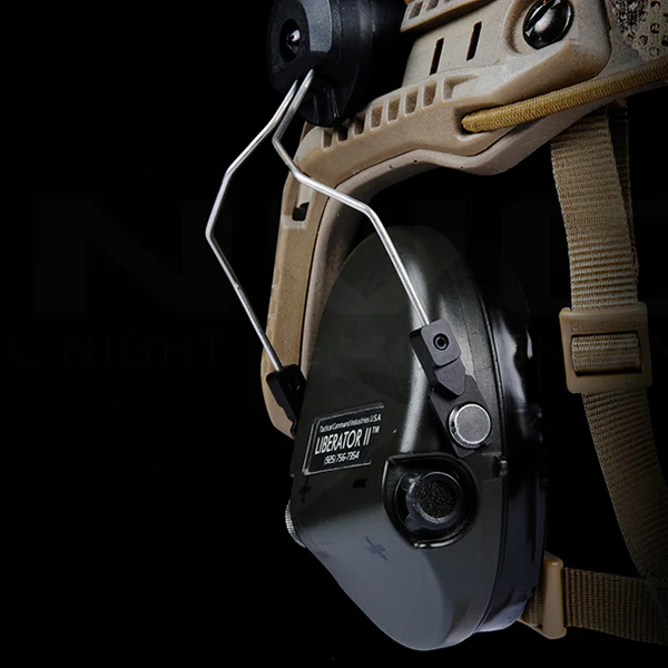 Peltor Comtac Liberator headset mounted on tactical helmet with AMP arm adapter for enhanced communication performance