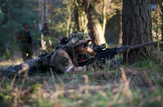 Tactical headset with push-to-talk system designed for military and law enforcement operations, featuring rugged design and noise-cancellation technology for clear communication in high-stress environments.