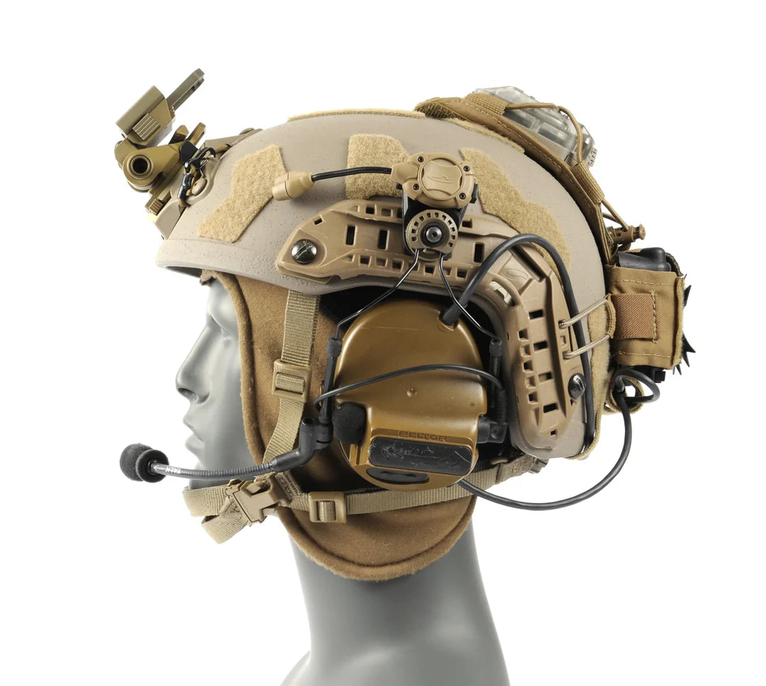 Tan variant of Micro ARC Rail Headset Adapters attached to a helmet.