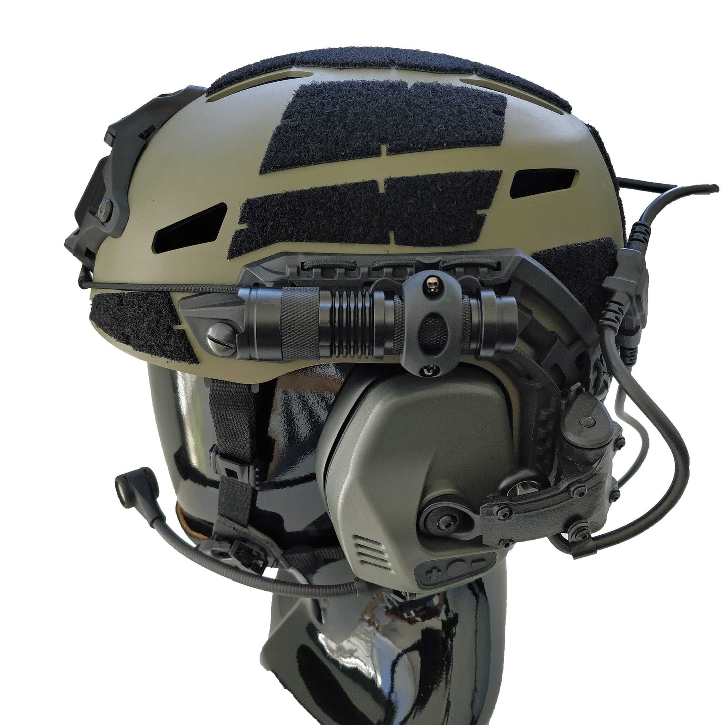 300 lumen tactical zoom helmet light mounted on a helmet for enhanced visibility.